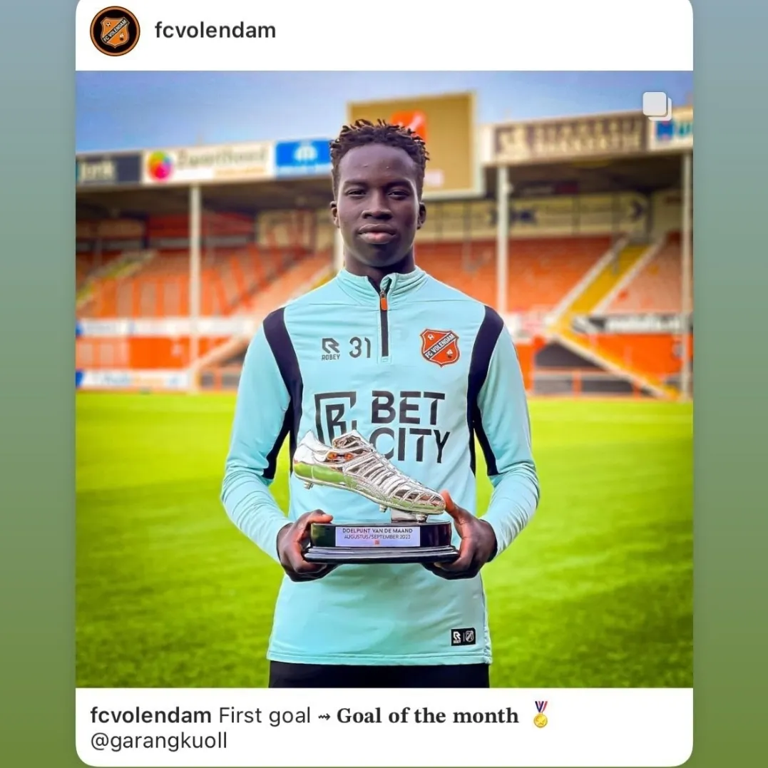 Garang Kuol with his Goal of the Month award