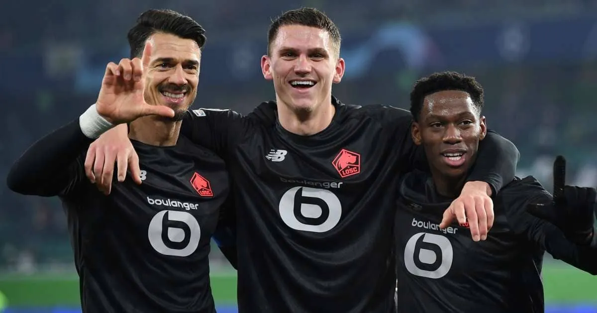 Jose Fonte Sven Botman and Jonathan David celebrating for Lille